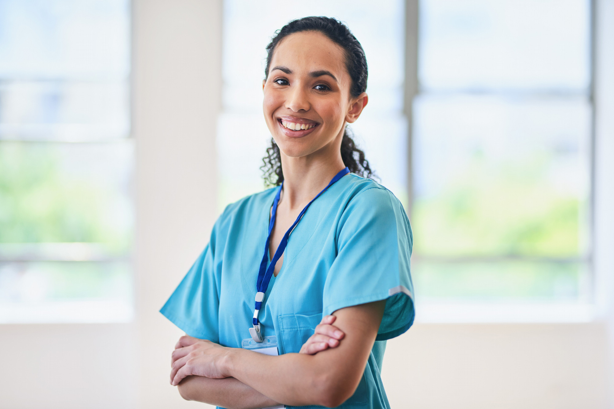 image of a nursing student in scrubs