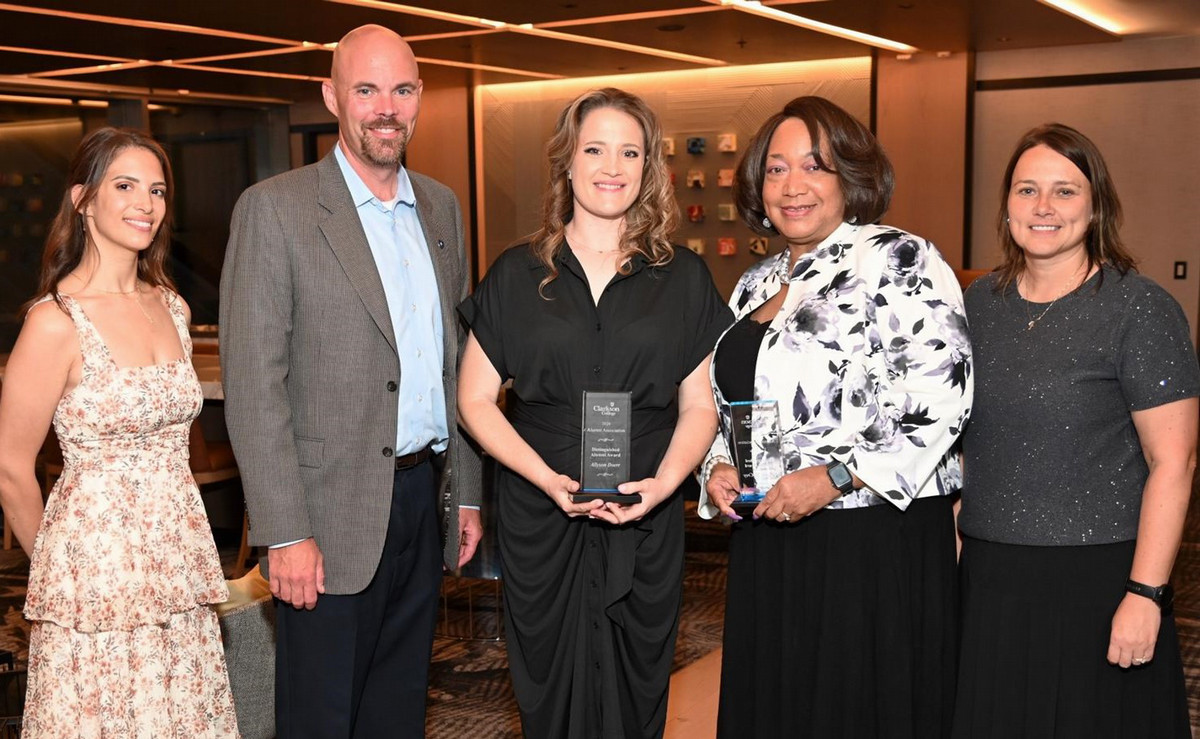 2 alumni receive awards, standing with College Alumni coordinator, Board President, and President Nebel.