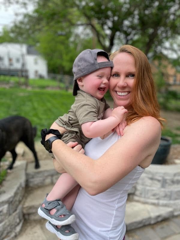 Katie Vaca holding her son.