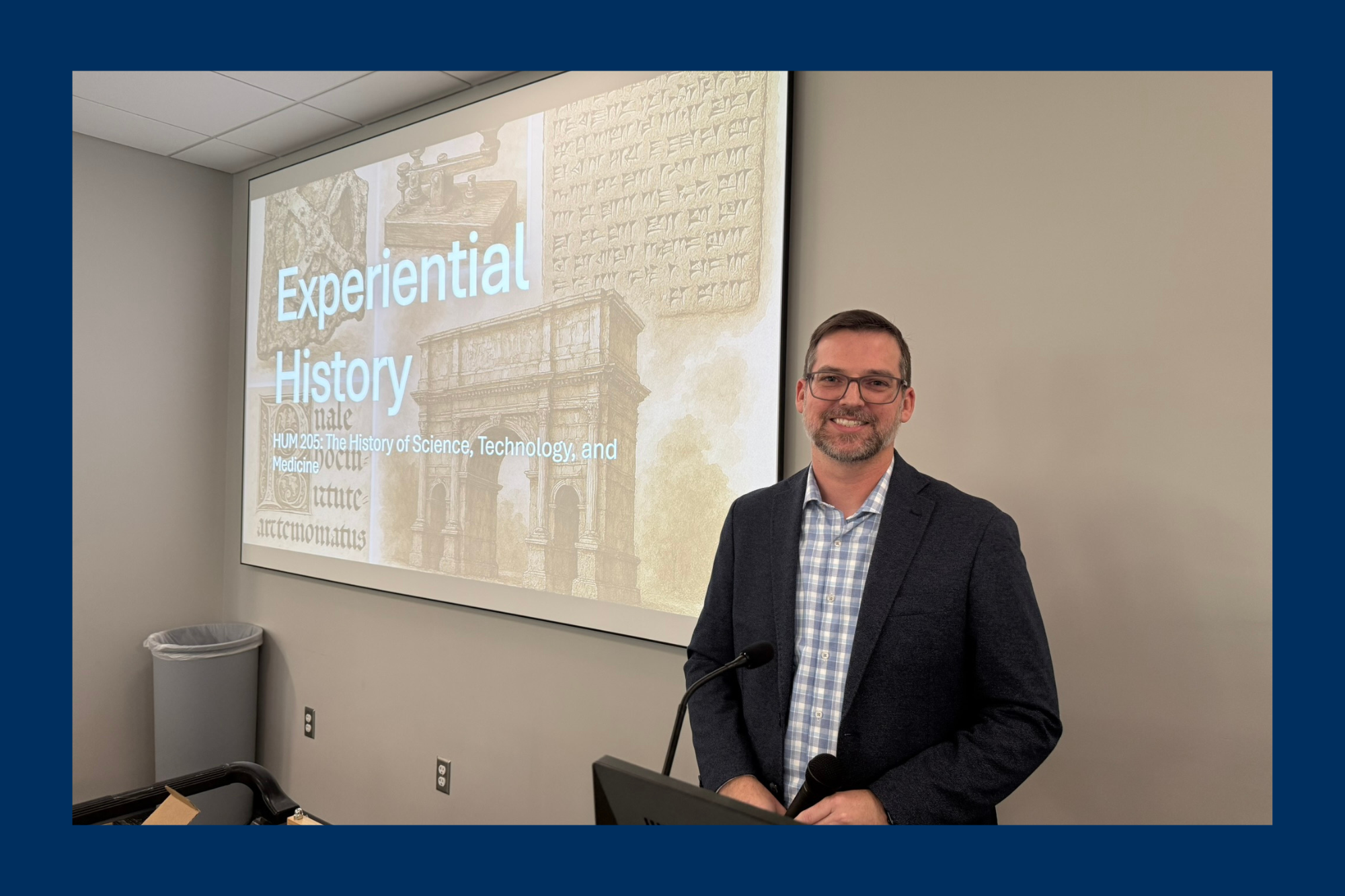 man standing at front of presentation