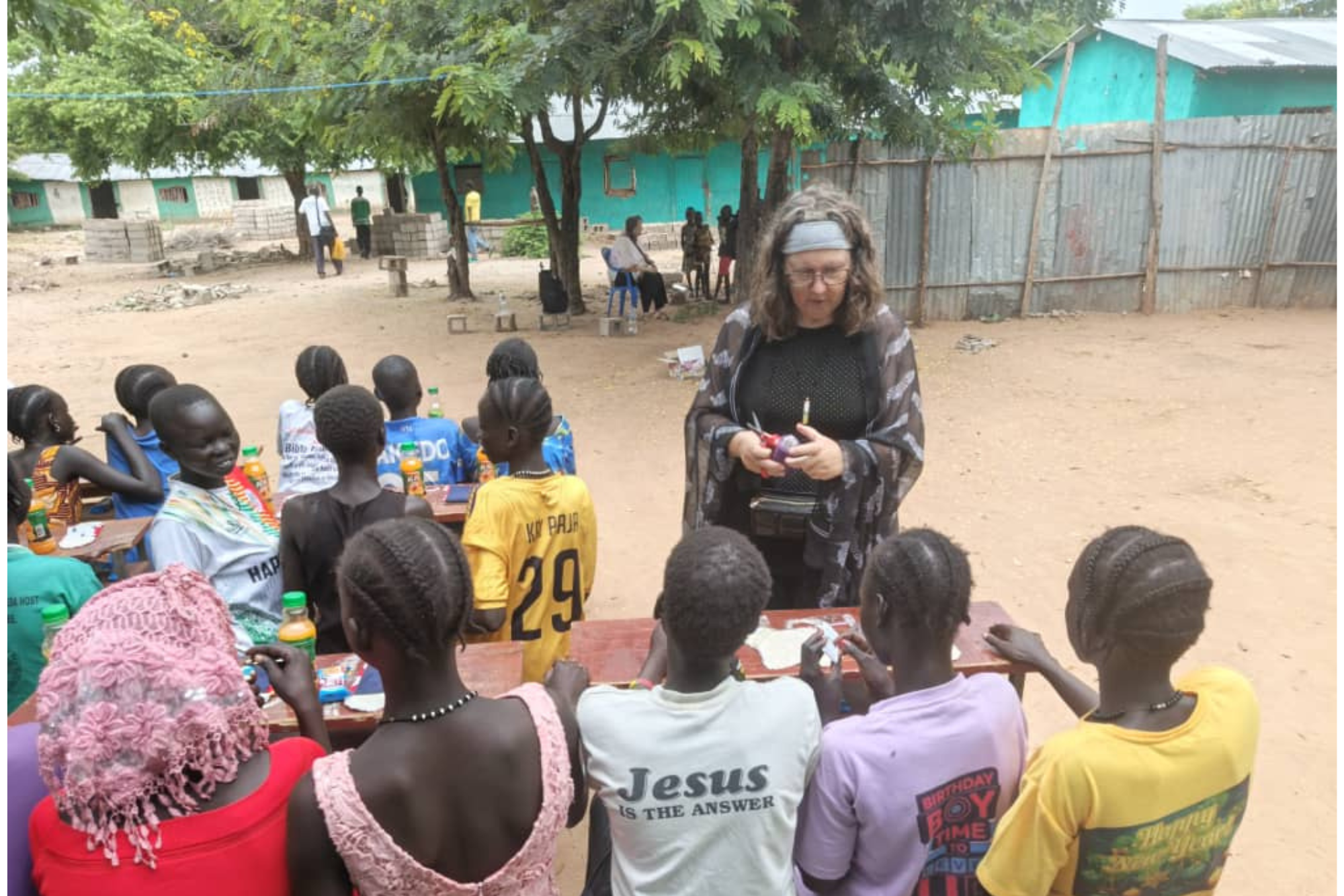 Danna Swartz pictured with young children in Ethiopia