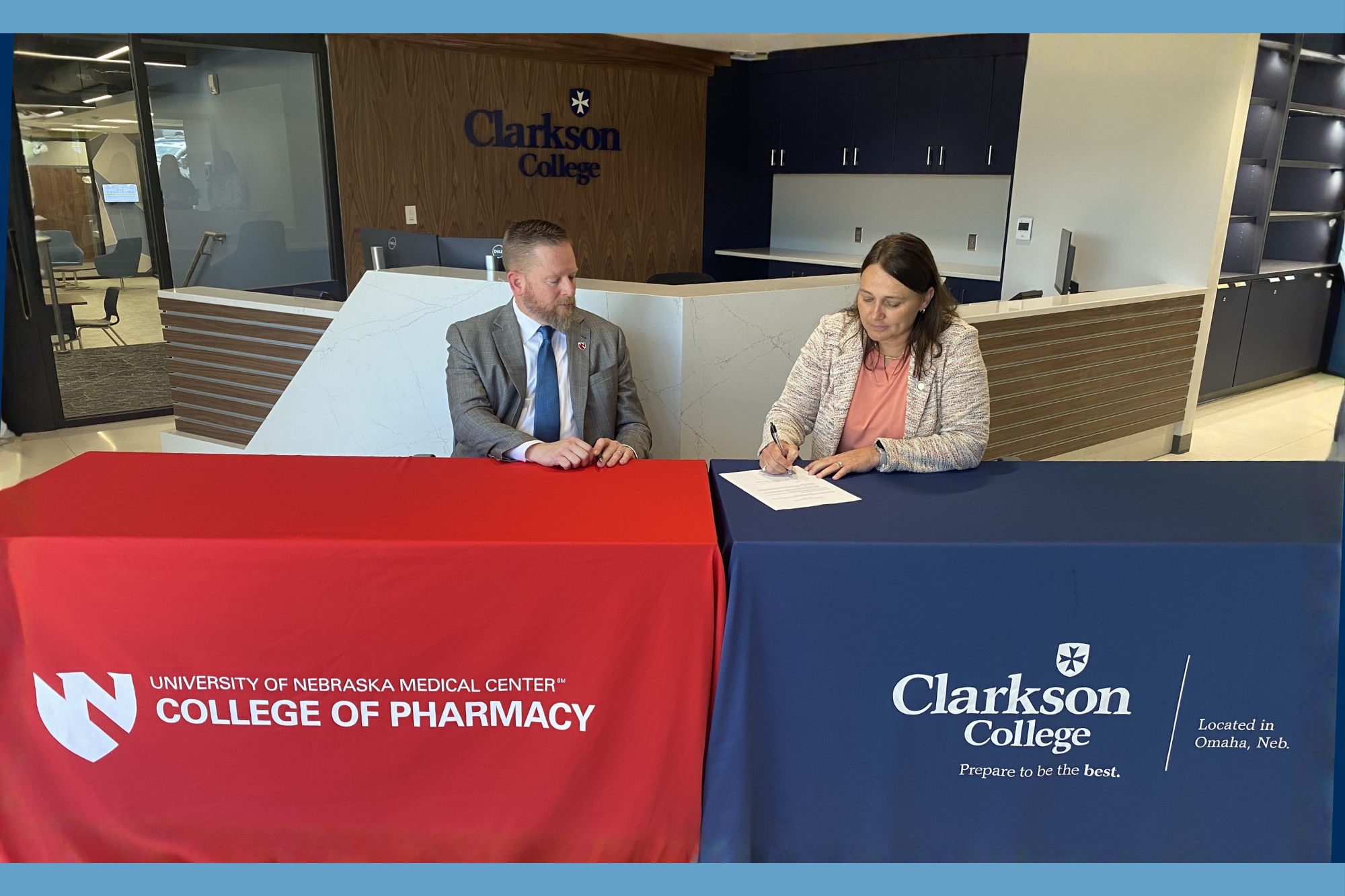 image of a pharmacist and a patient
