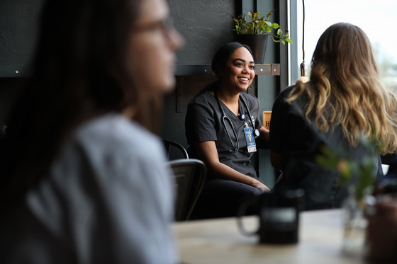 two students chatting in a casual setting